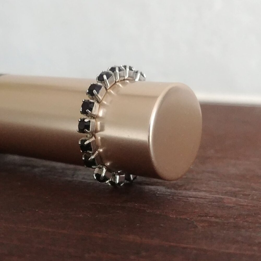 4/$20 Silver tone black stones elastic stretch ring